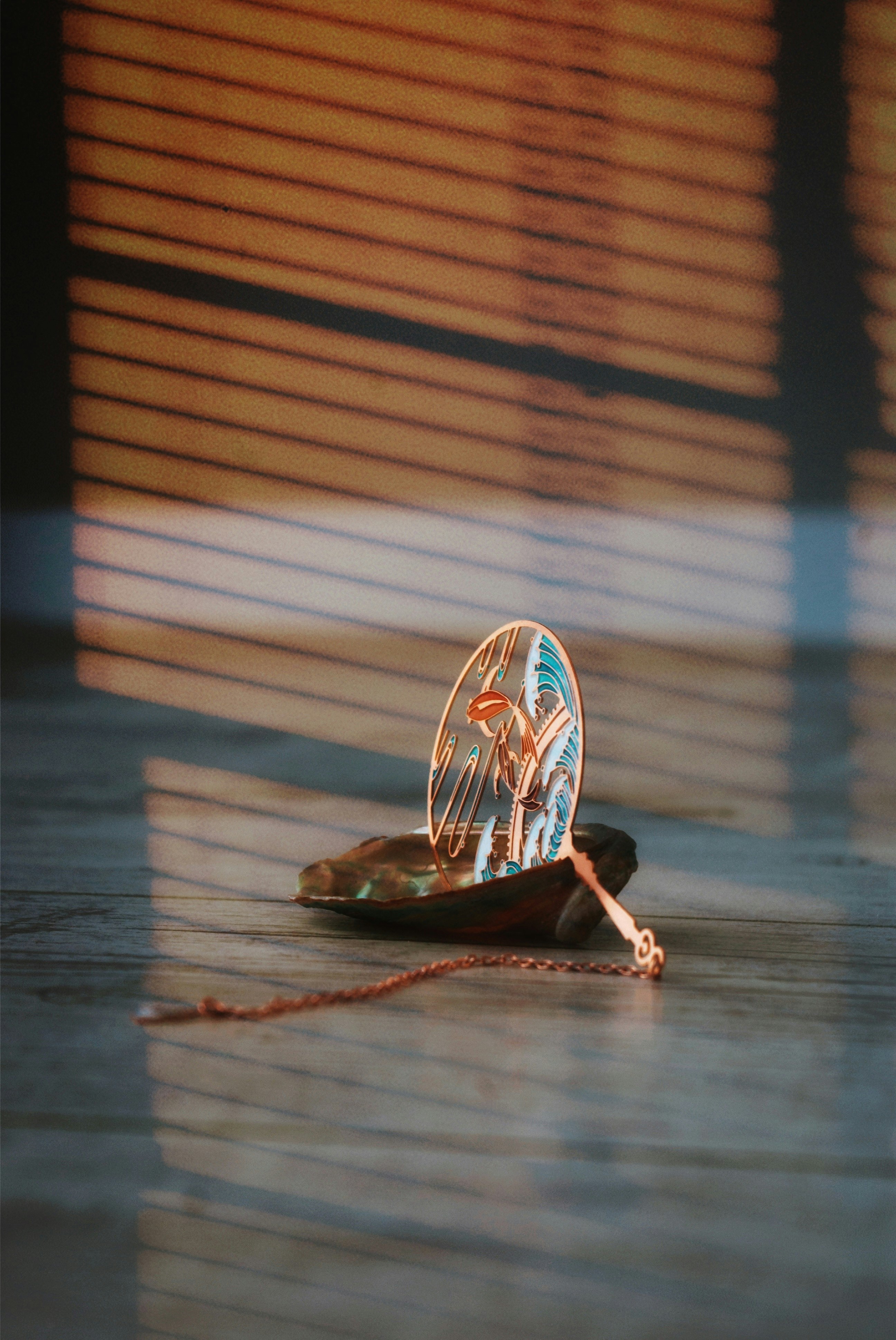 brown and white wooden fish figurine